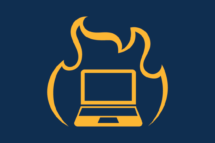 icon of computer surrounded by fire