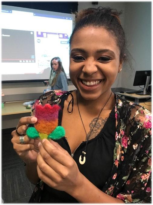 Student holding Play-Doh